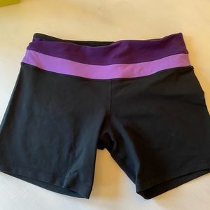 Lululemon luon shorts- size 6.   Blk & Purp Luon.   Inseam 4.5”, front rise 6”